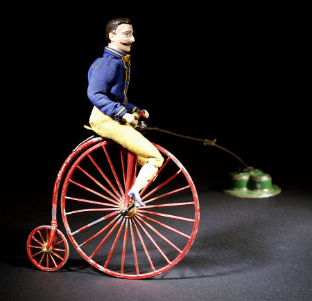 A Rare Clockwork  ''Blondin'' Cyclist -Painted Lead Figure, van 