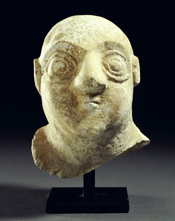 A Sumerian Limestone Head Of A Worshipper van 