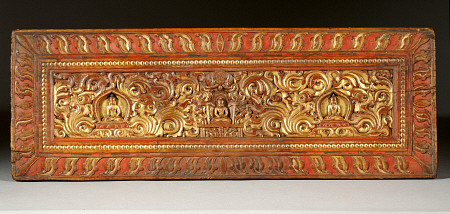 A Tibetan Gilt Wooden Manuscript Cover, circa 15th century van 