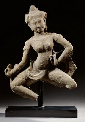 A Khmer, Baphuon Style, Sandstone Figure Of An Apsara Standing In Dancing Posture, 11th Century, 61