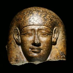 An Over Life-Size Limestone Head From An Anthropoid Sarcophagus