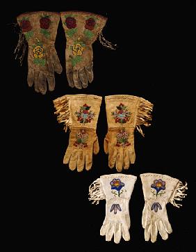 A Pair Of Nez Perce Beaded Hide Gauntlet And  Two Pairs Of Plains Beaded Hide Gauntlets