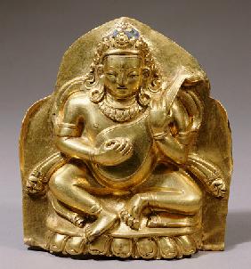 A Tibetan Gilt-Copper Plaque Depicting Dhrtarashtra Seated On A Lotus, Playing A Lute
