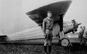 Charles Lindbergh American aviator in front of his plane Spirit of Saint Louis taking off from Roose