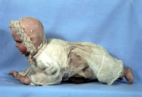 'Creeping Baby' clockwork doll, 1871 van 