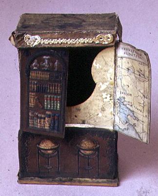 Doll's house furniture: Cardboard bookcase, embossed inside showing a map with the new Australian go van 
