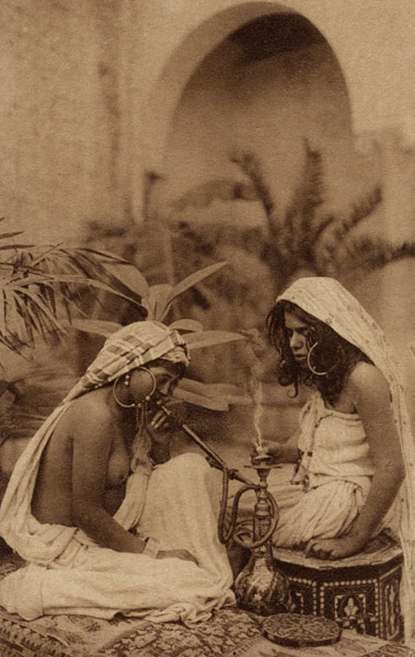 Harem girls smoking a hookah, from an early 20th century postcard (sepia photo)  van 