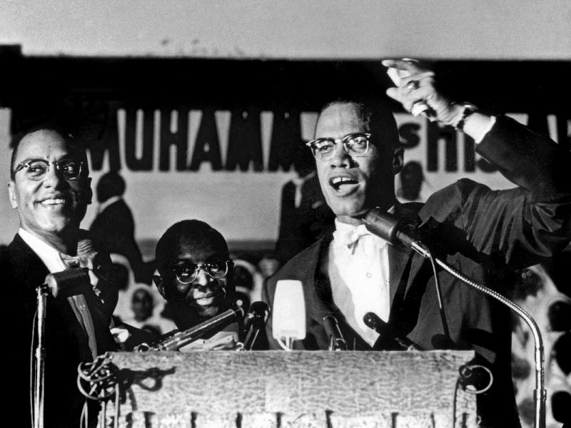 Malcolm X during a speech during a rally of Nation of Islam at Uline Arena, Washington, photo by Ric van 