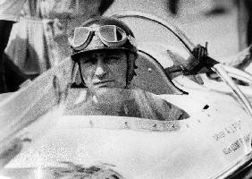 racing driver Fangio here at the wheel during race in Monza