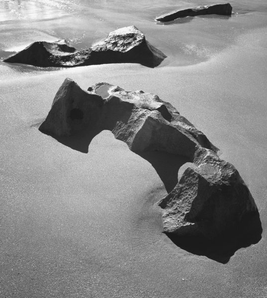 Rock on sand (b/w photo)  van 