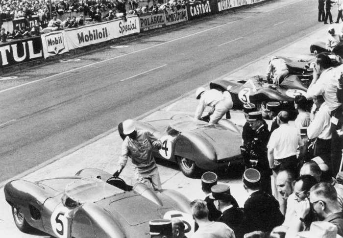 Start of the Le Mans 24 Hours, France, 1959. Roy Salvadori prepares to climb aboard his Aston Martin van 