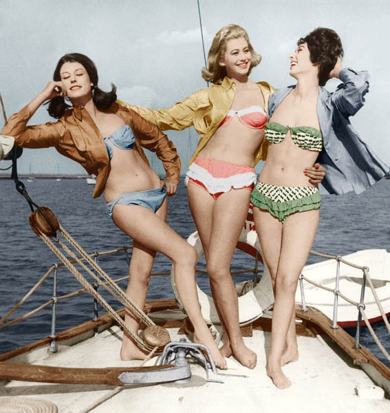 Three young women wearing bikinis colourized document van 