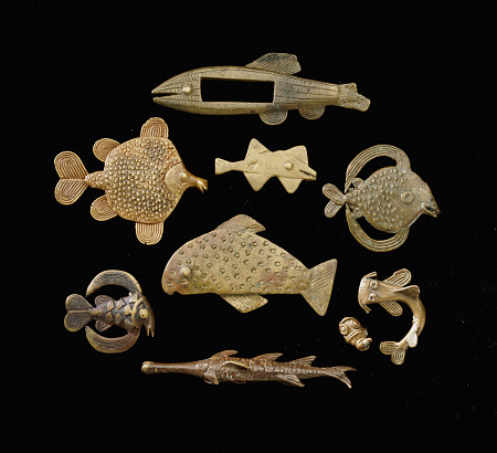 Thirty-Six Akan Brass Goldweights Cast As Fish In Varying Forms van 
