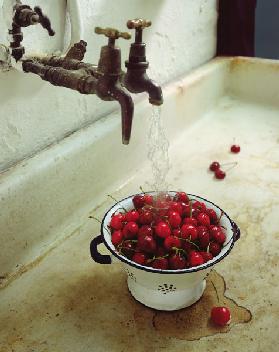 Washing cherries, 1988 (colour photo) 
