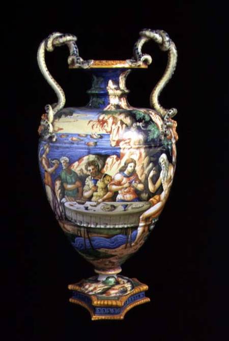 Maiolica urn with two handles in the shape of serpents, the body decorated with an al fresco banquet van Orazio Fontana of Urbino