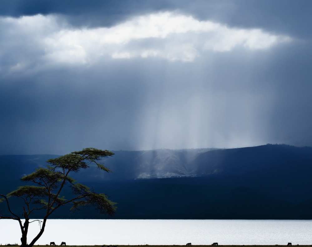Clouds over lake Naivasha van Piet Flour