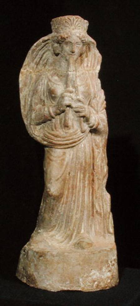 Statuette of a woman playing a double flute, from Tunisia van Punic