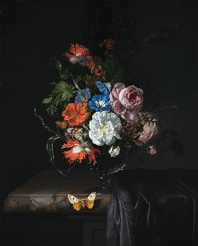 A Still Life of Flowers in a vase on a ledge