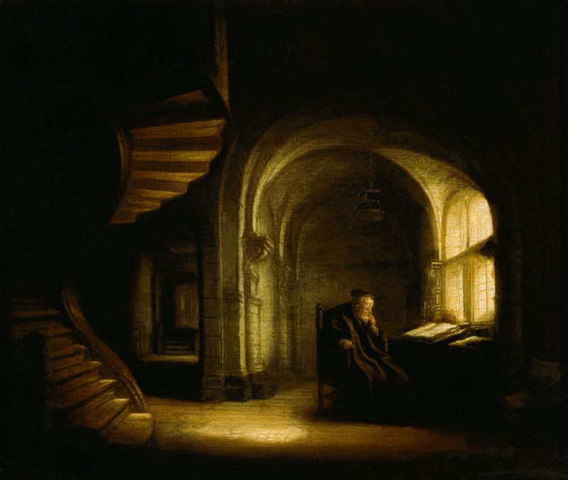 Filosoof met een open boek van Rembrandt van Rijn