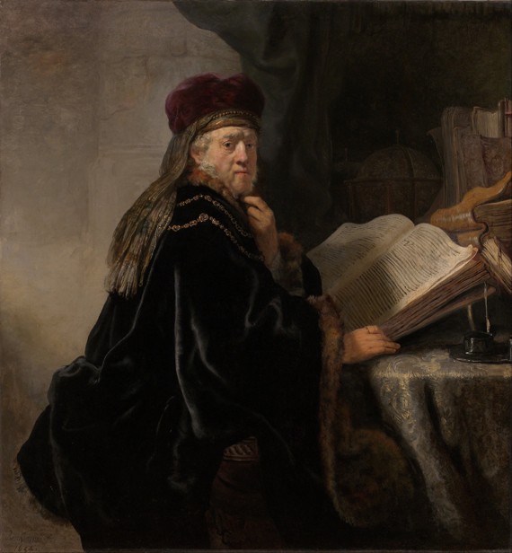 A Scholar Seated at a Desk (Scholar at his Study) van Rembrandt van Rijn