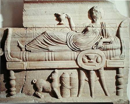 Detail from a sarcophagus depicting a woman reclining on a bench van Roman