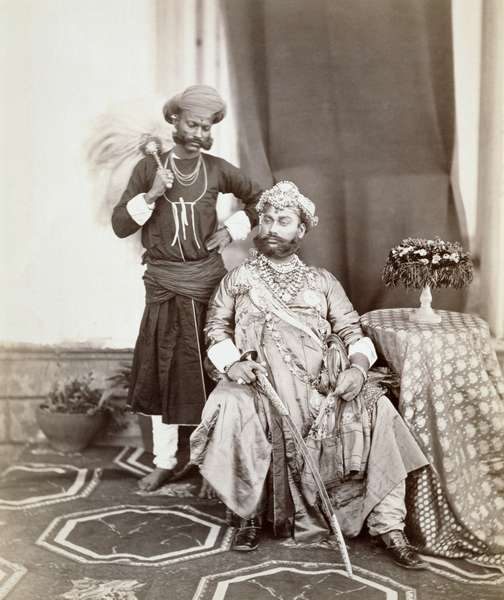 His Highness Maharaja Tukoji Rao (1844-86) II of Indore and attendant, 1877 (albumen print)  van S. Bourne