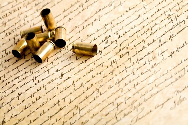 bullet casings on bill of rights van Sascha Burkard