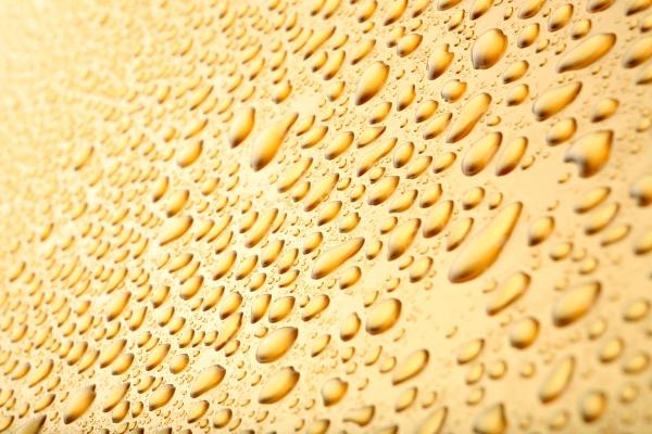 water drops background on gold van Sascha Burkard