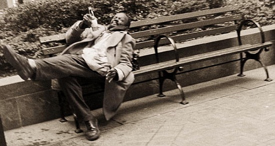 Drunk man on a park bench van Stephen  Spiller