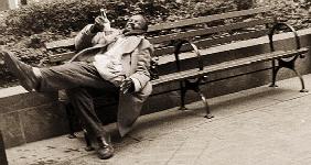 Drunk man on a park bench