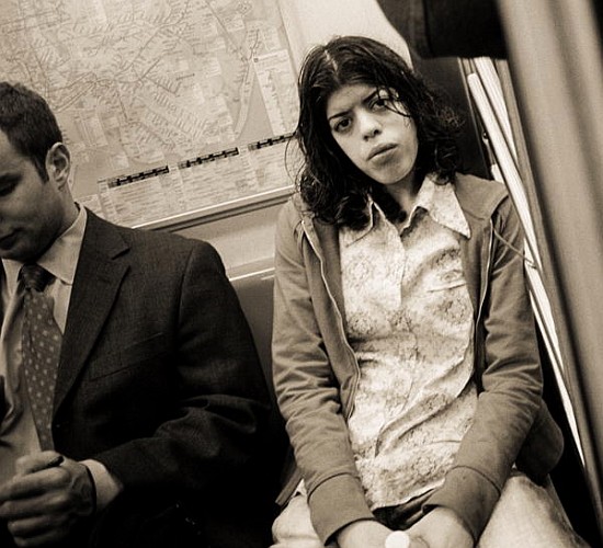 Woman sitting on a subway and staring, 2004 (b/w photo)  van Stephen  Spiller