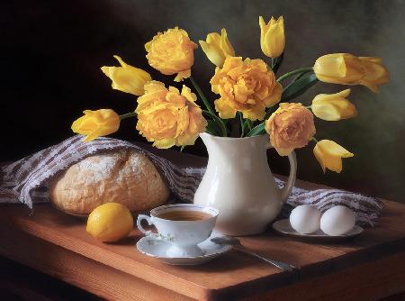 Still life with a bouquet of yellow tulips