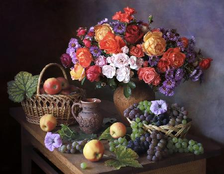 Still life with autumn bouquet and fruits