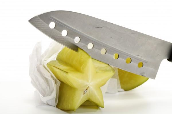 Die Sternfrucht mit Messer1 van Thomas Haupt