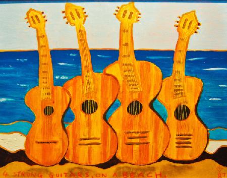4 strung guitars on a beach