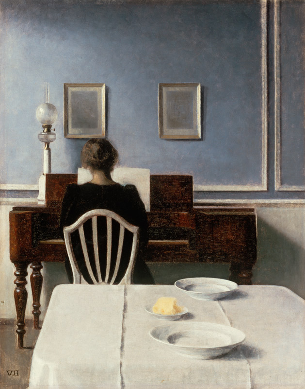 Interieur met jonge vrouw aan de piano van Vilhelm Hammershoi
