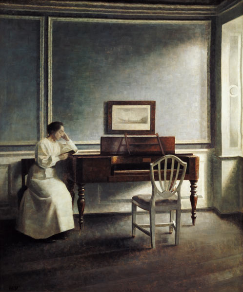 Frau, neben einem Klavier in einem Buch lesend. van Vilhelm Hammershoi