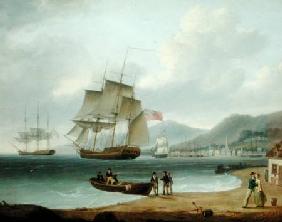 Merchant Ships Under Sail and at Anchor off a Town