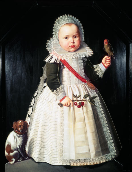 Portrait of a young boy holding a parrot van Wybrand Symonsz de Geest